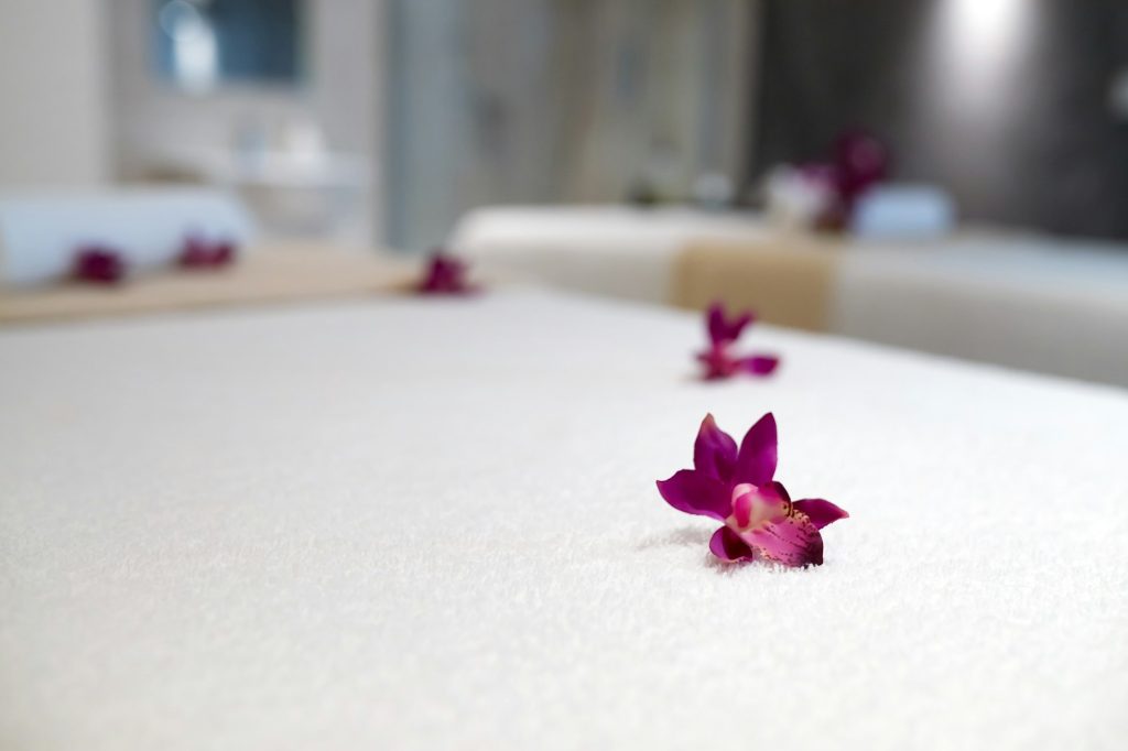 Flowers decorating massage beds