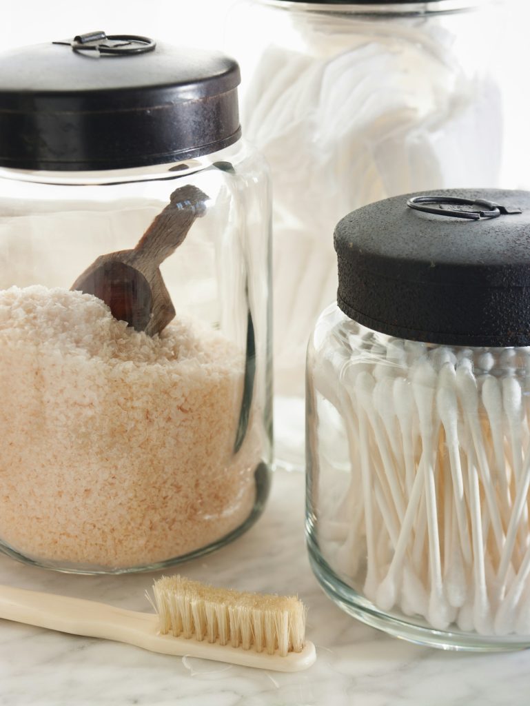 Sturdy glass storage jars for body scrub granules and for cottonwool